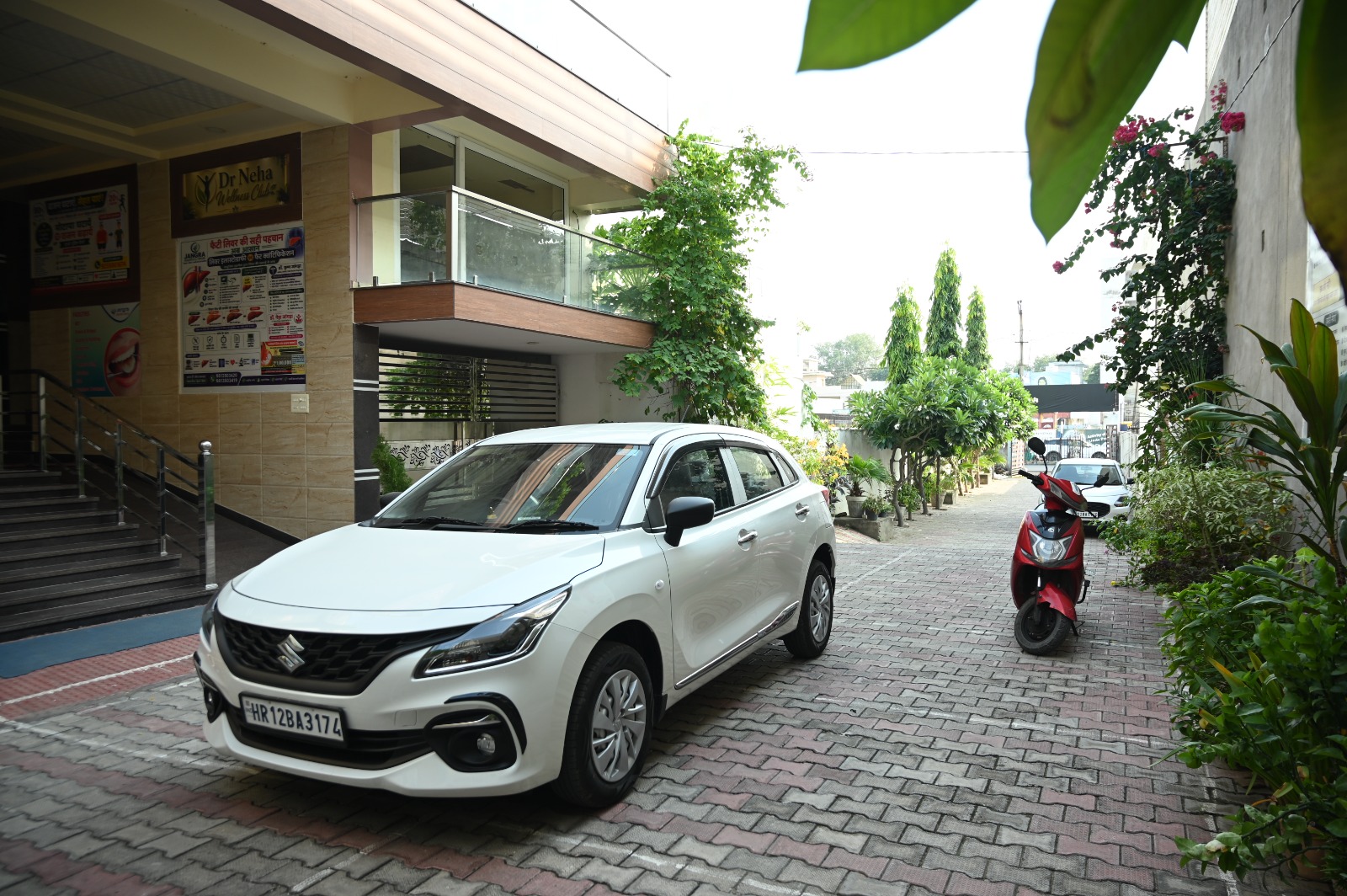 Paved parking driveway and building exterior of Jangra Diagnostic Centre